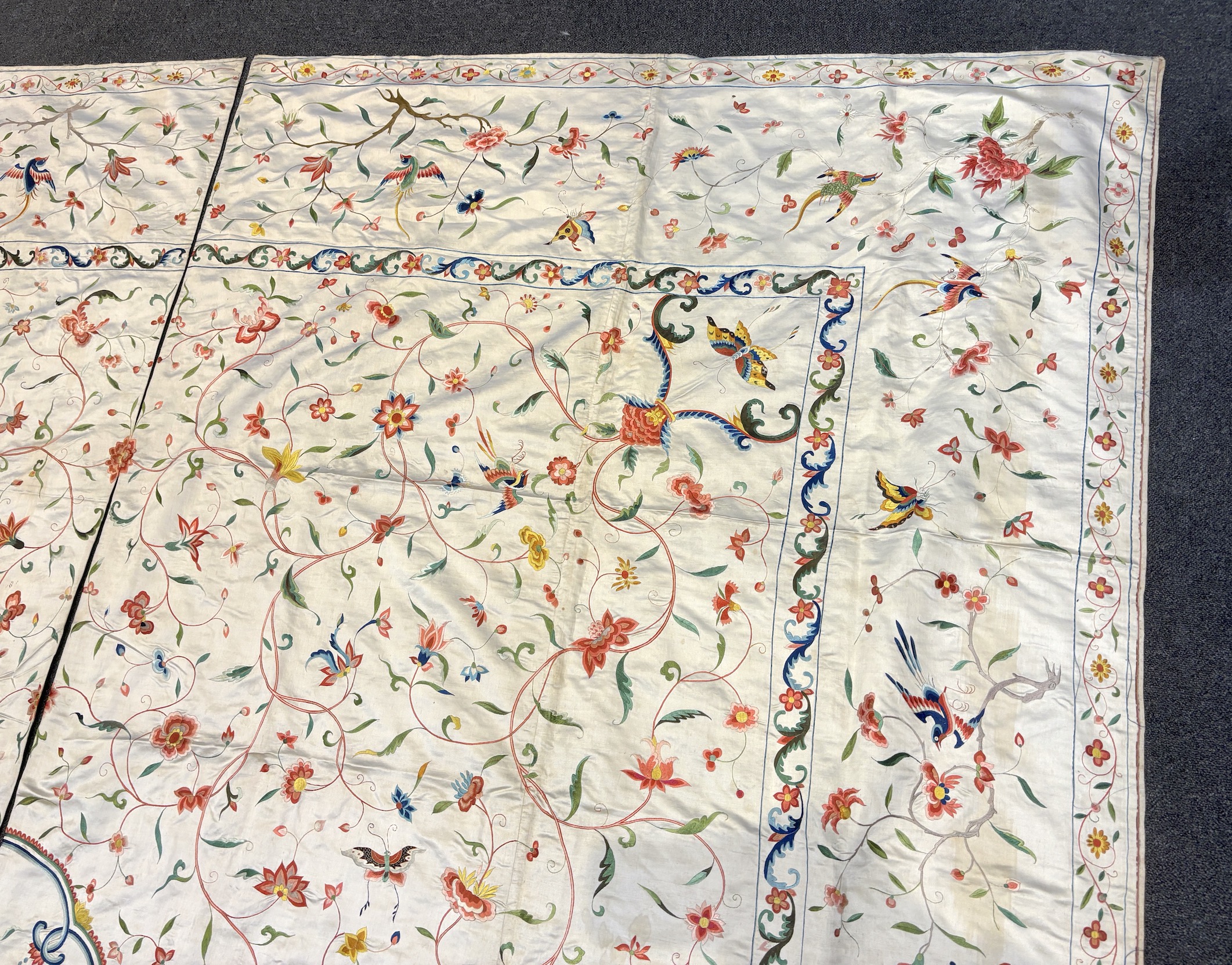 A fine Chinese 19th century silk polychrome embroidered cream silk bed cover, 290cm long x 278cm wide (both curtains together)